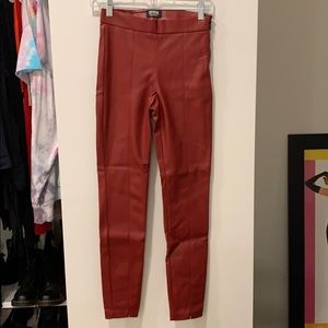 Red faux leather pants